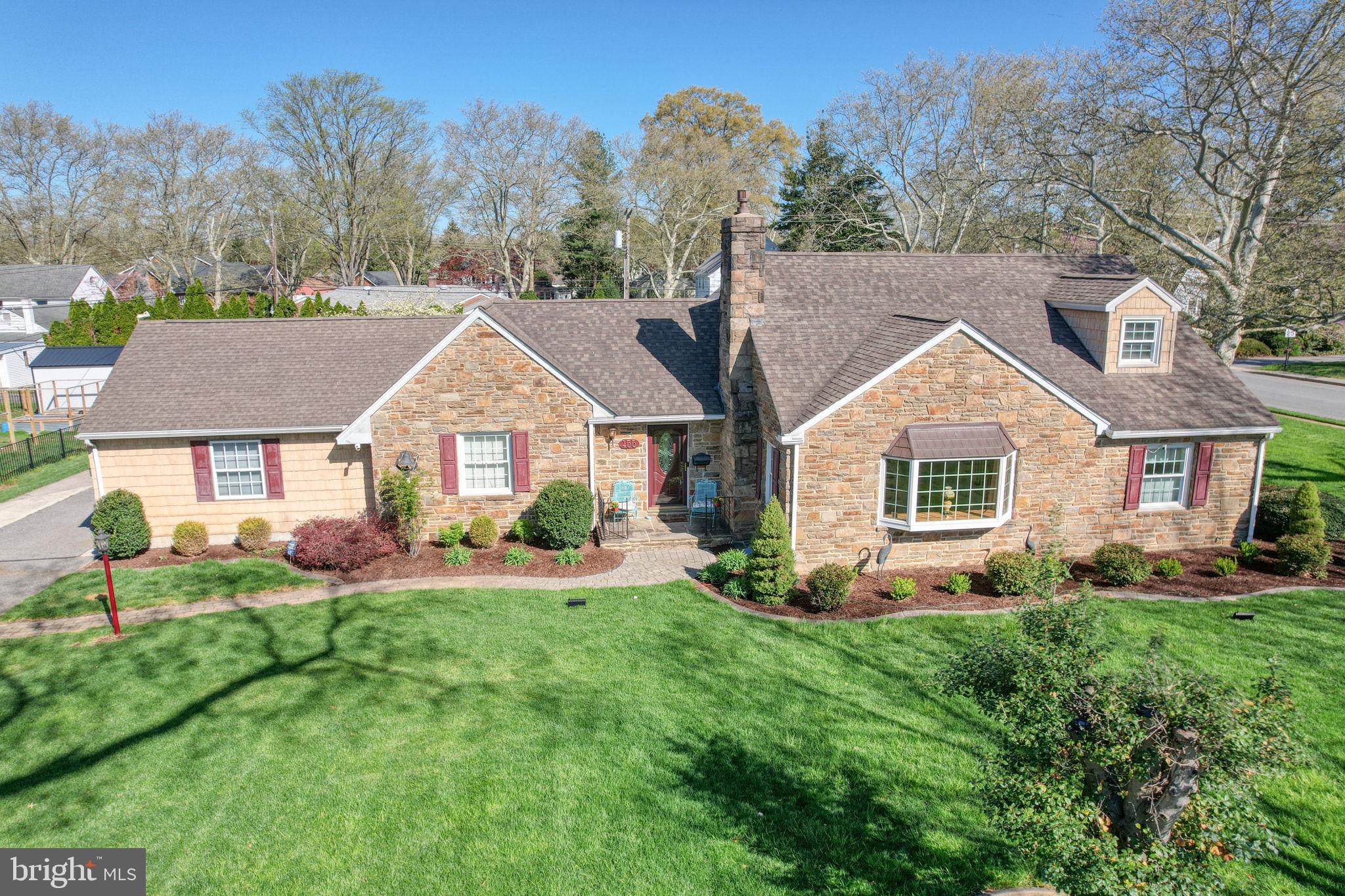 455 East Loockerman Street Dover, DE 19901 - Photo 43 of 55 a front view of a house with a yard and trees