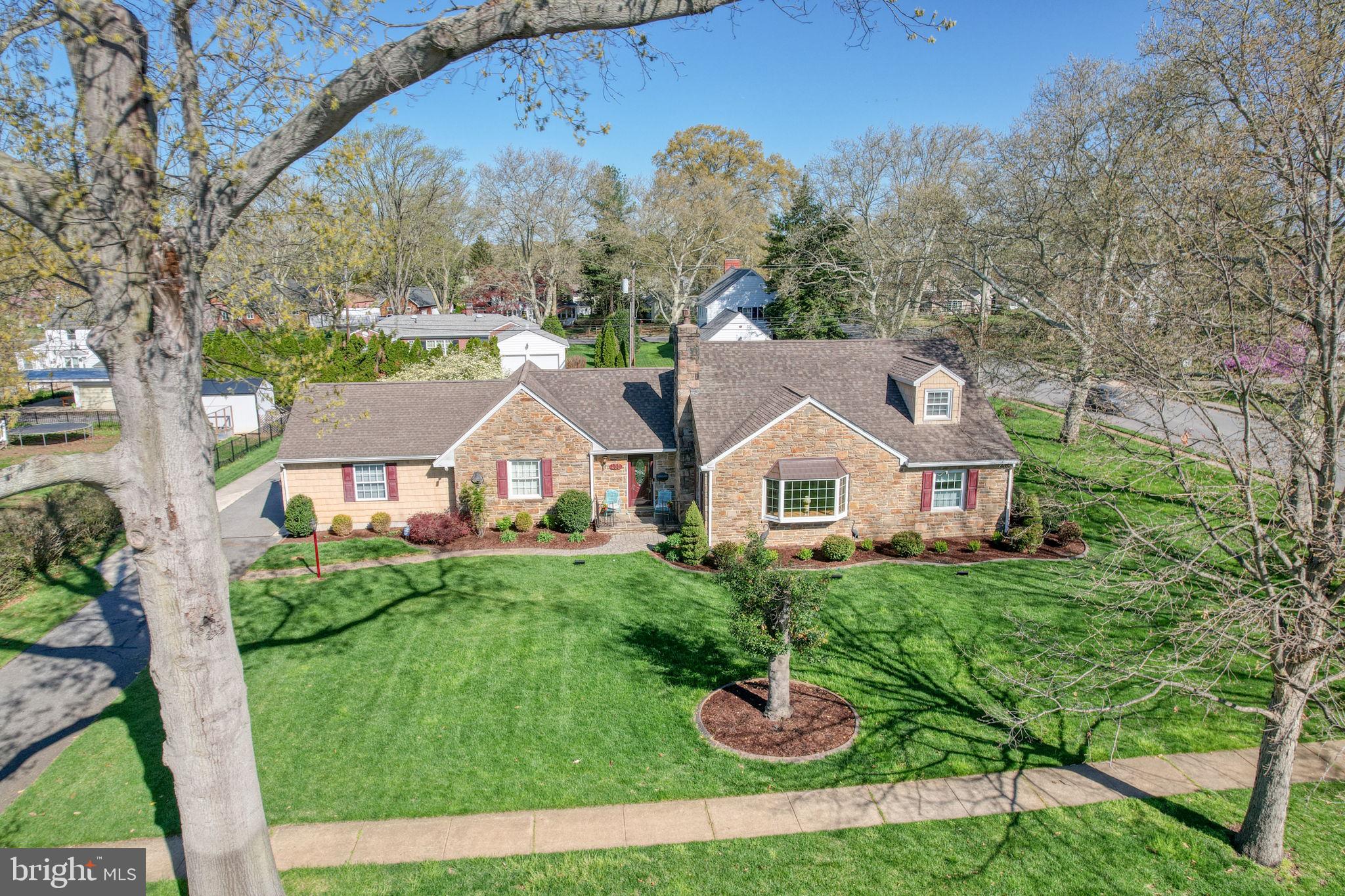 455 East Loockerman Street Dover, DE 19901 - Photo 44 of 55 a view of a big house with a big yard and large trees