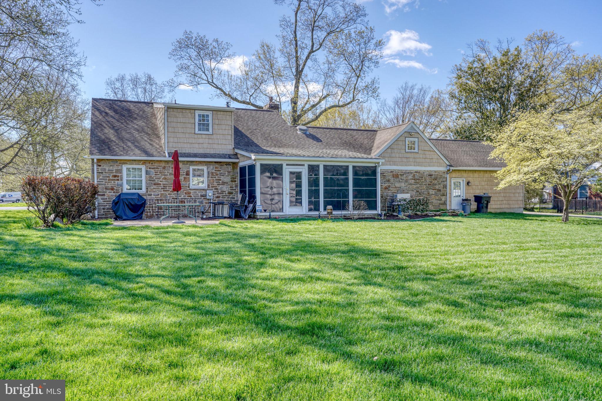 455 East Loockerman Street Dover, DE 19901 - Photo 53 of 55 a large house with a big yard and large trees