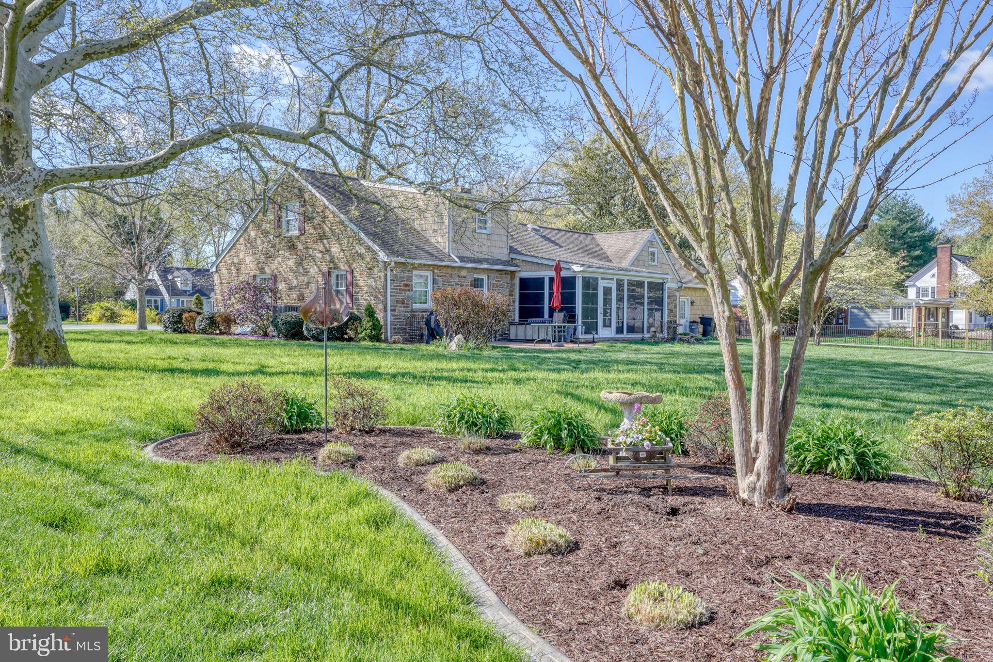 455 East Loockerman Street Dover, DE 19901 - Photo 54 of 55 a front view of a house with garden