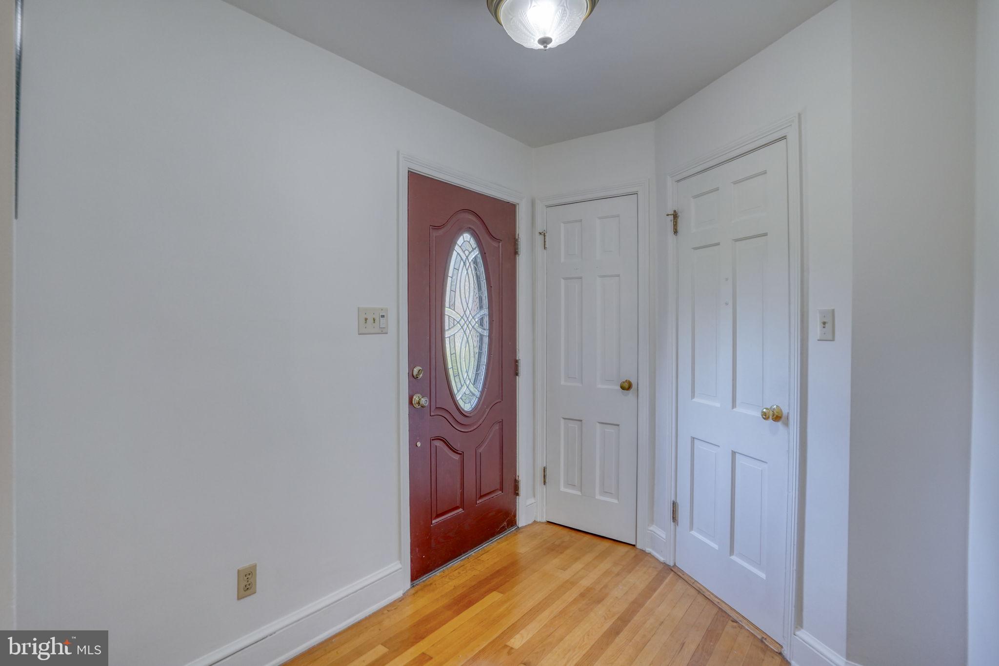 455 East Loockerman Street Dover, DE 19901 - Photo 6 of 55 a view of a room with wooden floor and bathroom view
