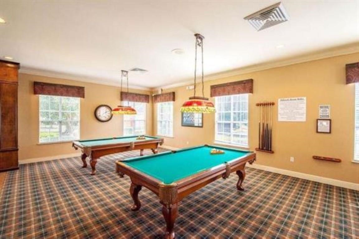 520 Florida Club Boulevard, Unit 104 St. Augustine, FL 32084 - Photo 15 of 20 a room with pool table and windows