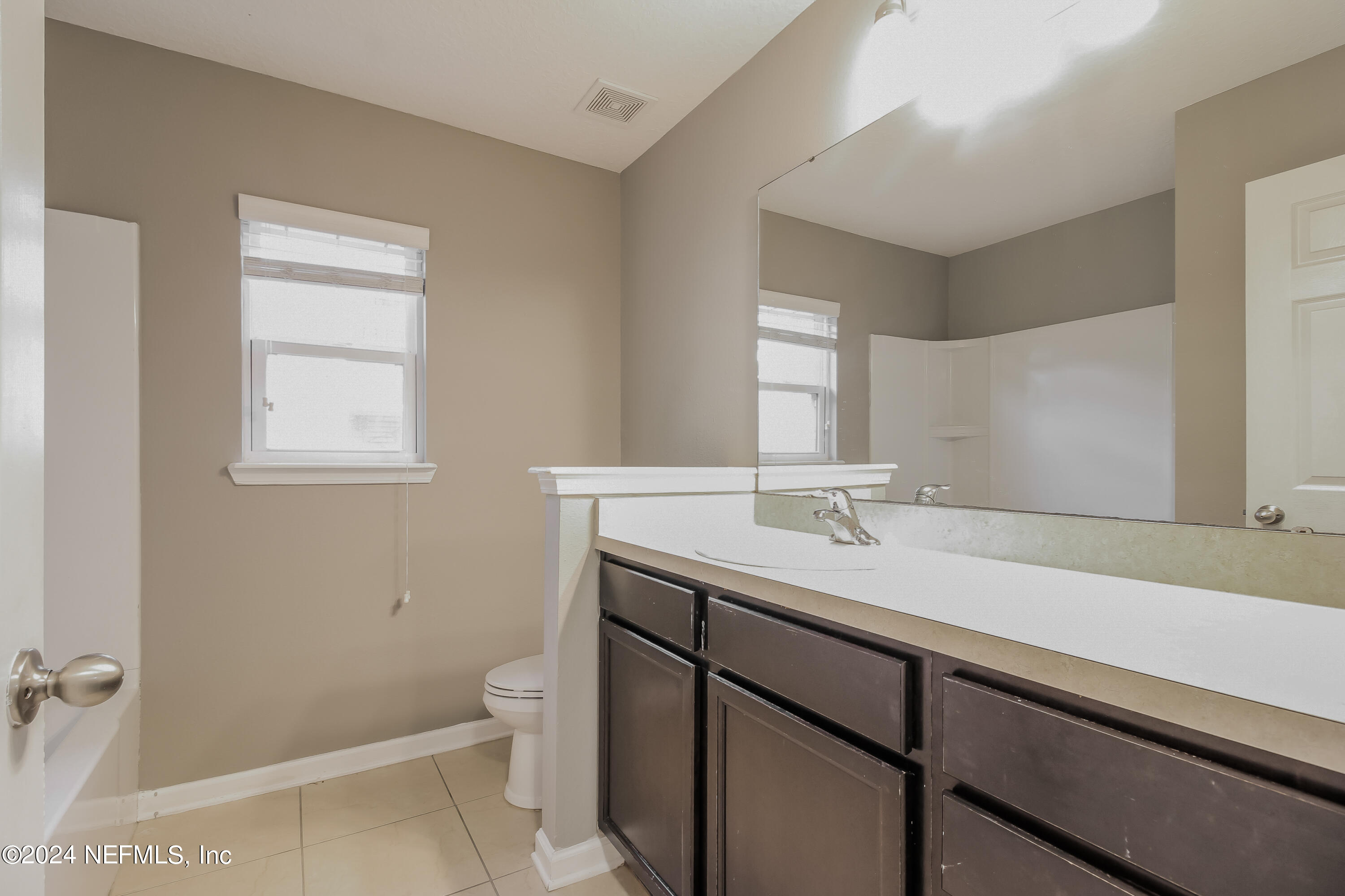 96477 Commodore Point Drive Yulee, FL 32097 - Photo 11 of 20 010-photo-main-bathroom-13532796