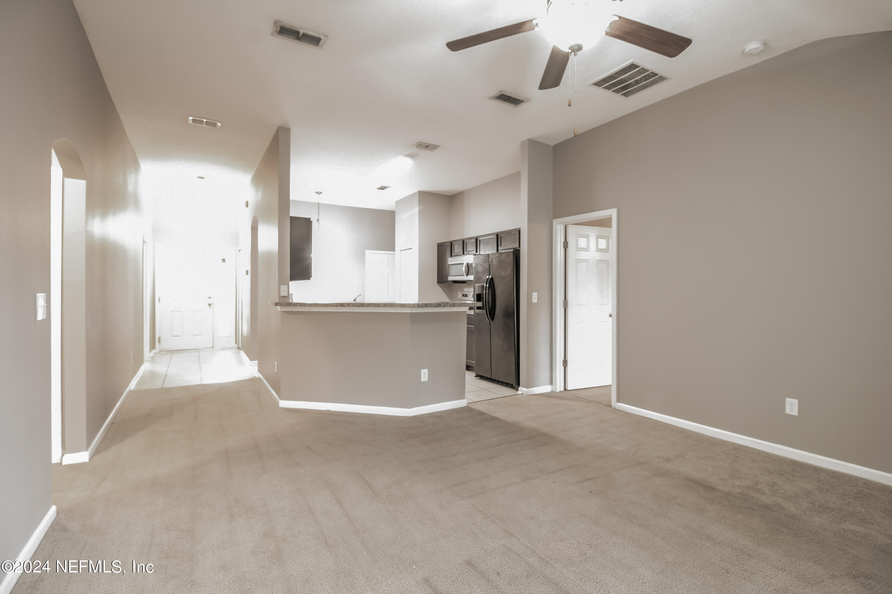 96477 Commodore Point Drive Yulee, FL 32097 - Photo 3 of 20 002-photo-living-room-13532811