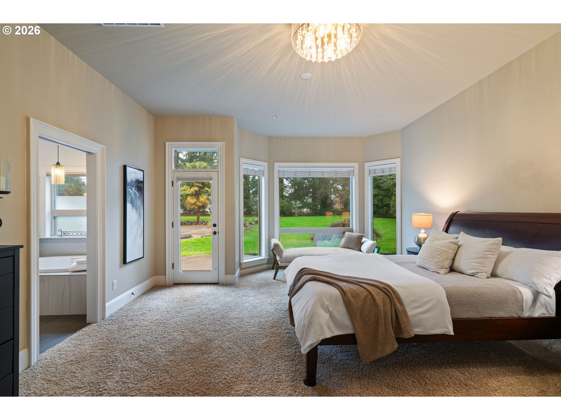 510 Northeast 224th Circle Ridgefield, WA 98642 - Photo 22 of 48 a bedroom with a bed and a large window