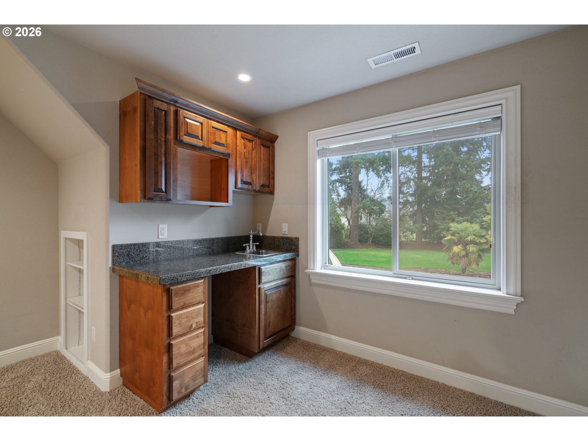 510 Northeast 224th Circle Ridgefield, WA 98642 - Photo 36 of 48 a kitchen with stainless steel appliances granite countertop a stove a sink and a microwave