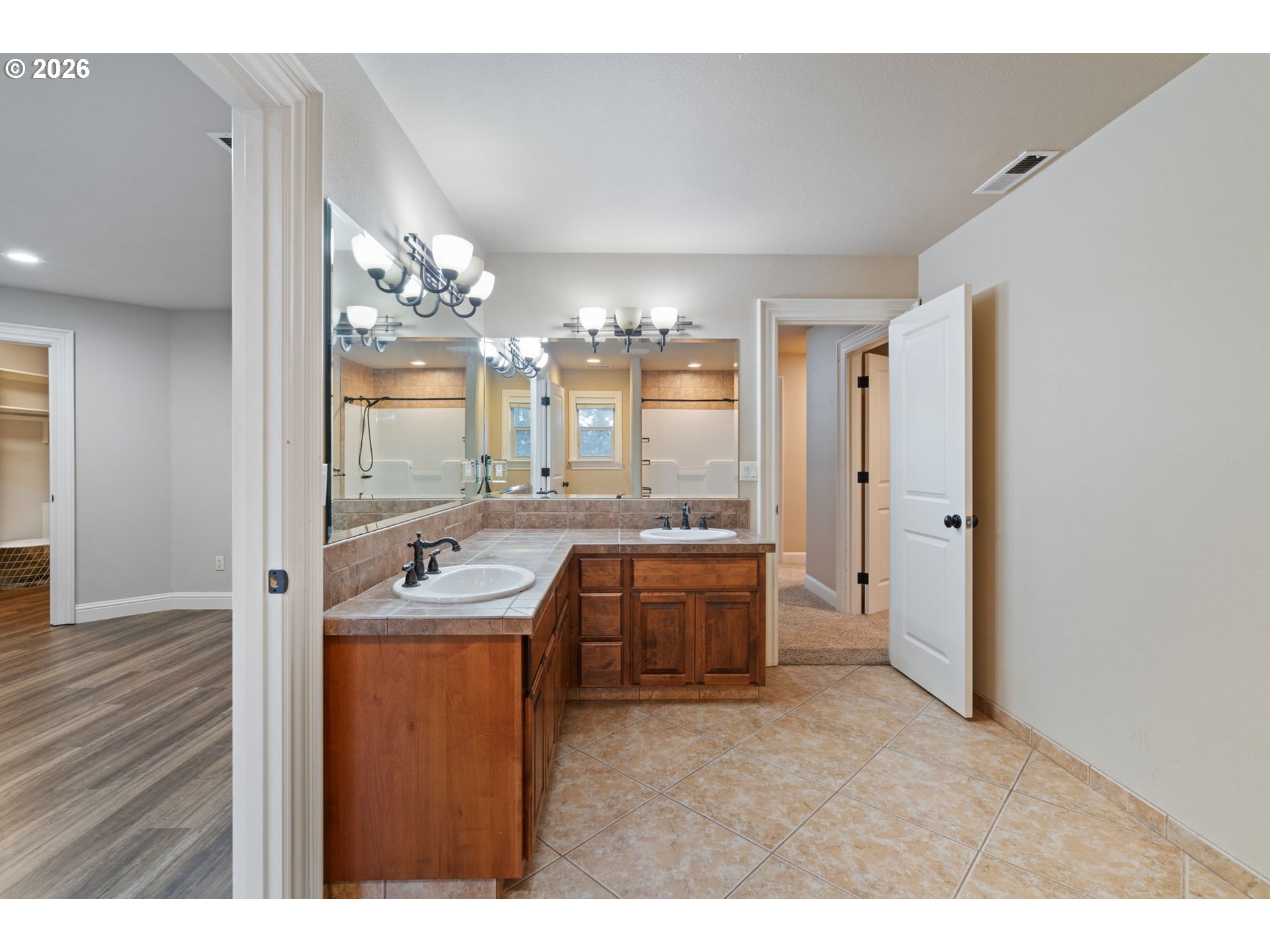 510 Northeast 224th Circle Ridgefield, WA 98642 - Photo 43 of 48 a bathroom with a sink and a mirror