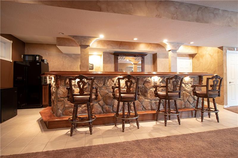 385 Pleasant Valley Road Bulger, PA 15019 - Photo 20 of 25 Great bar area for entertaining! Includes full size refrigerator, electric stove, and sink!