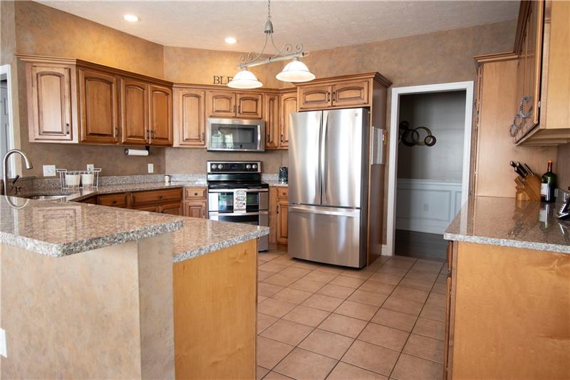 385 Pleasant Valley Road Bulger, PA 15019 - Photo 6 of 25 Plenty of space in this 26X14 Kitchen with Stainless Steel Appliances!