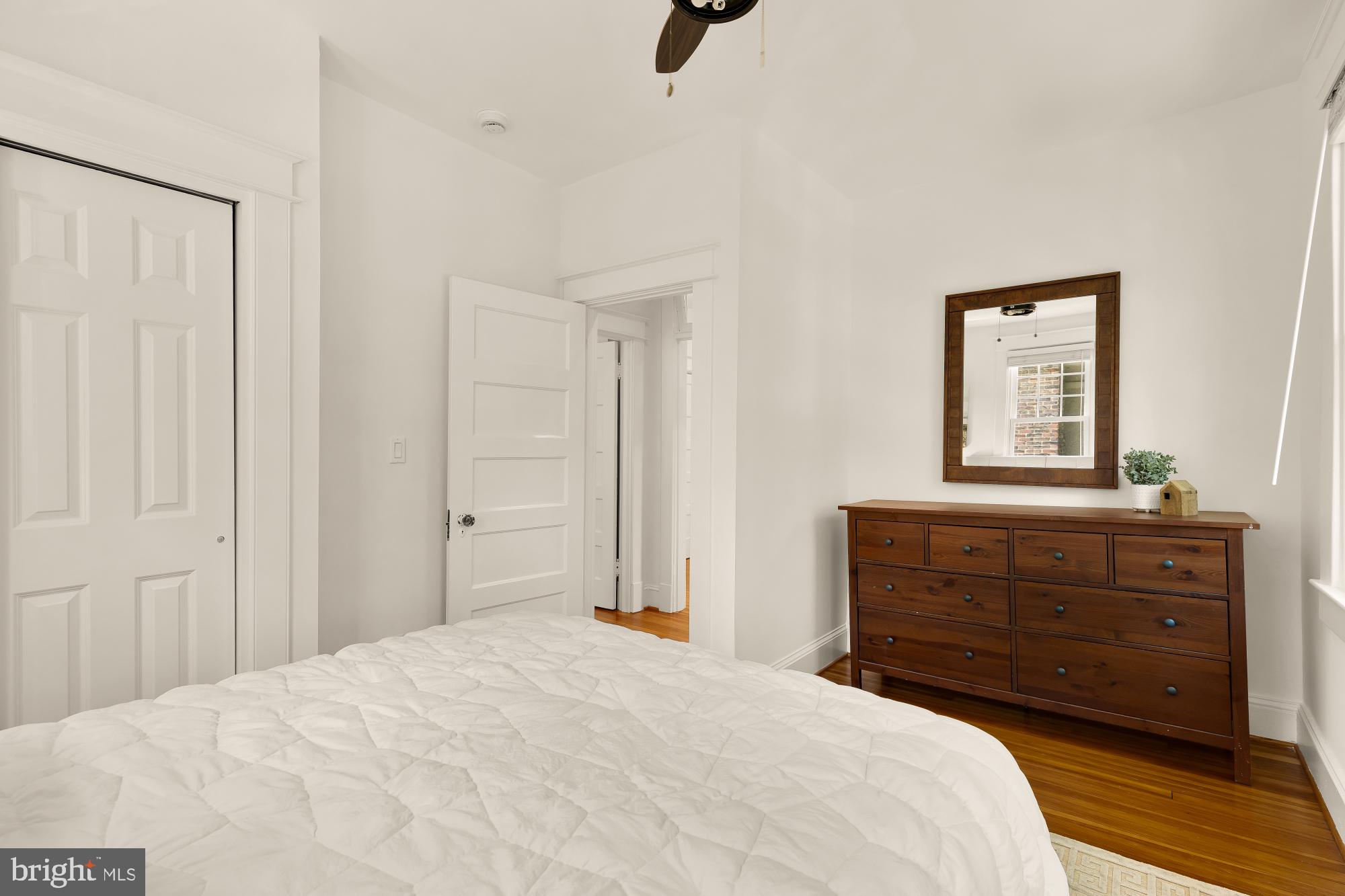 3707 Military Road Northwest Washington, DC 20015 - Photo 31 of 60 a bedroom with a bed and a dresser