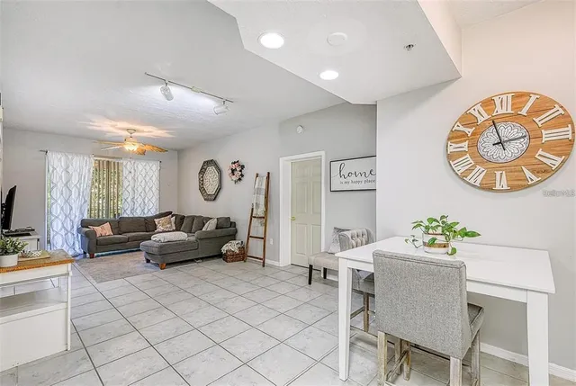 a living room with furniture and a table