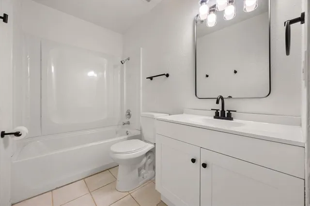 a view of a kitchen with electric appliances