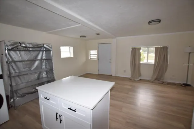 an empty room with windows