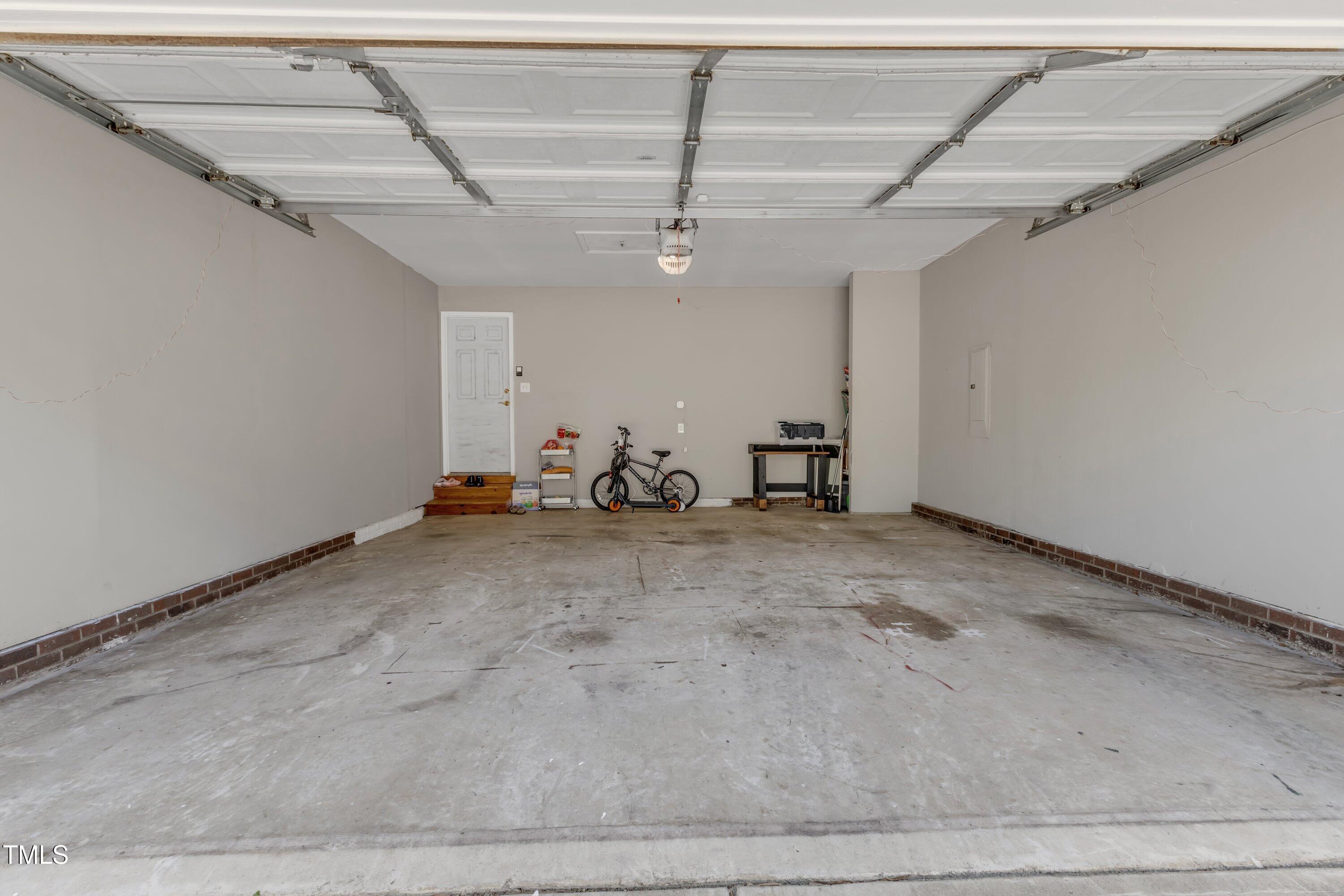 9512 Anson Grove Lane Raleigh, NC 27615 - Photo 31 of 39 a view of a garage
