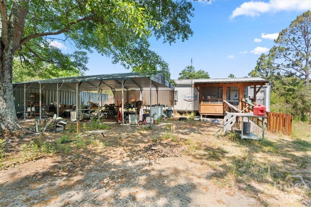 136 Wildwood Church Road Pembroke, GA 31321 - Photo 27 of 29 covered carport with ADU
