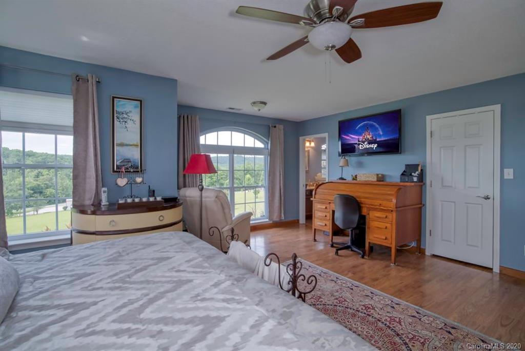 126 Barkers Grove Road Union Grove, NC 28689 - Photo 12 of 48 a living room with furniture and a fireplace
