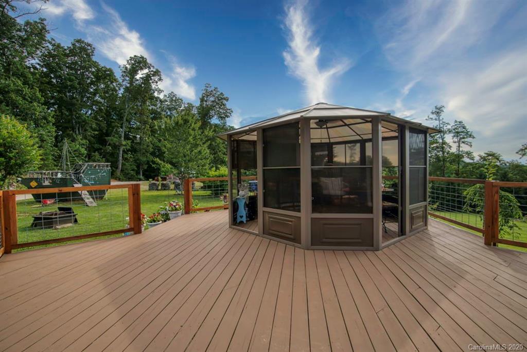 126 Barkers Grove Road Union Grove, NC 28689 - Photo 26 of 48 a view of a deck with wooden floor and fence