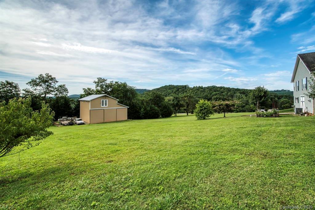 126 Barkers Grove Road Union Grove, NC 28689 - Photo 29 of 48 a house view with a garden space