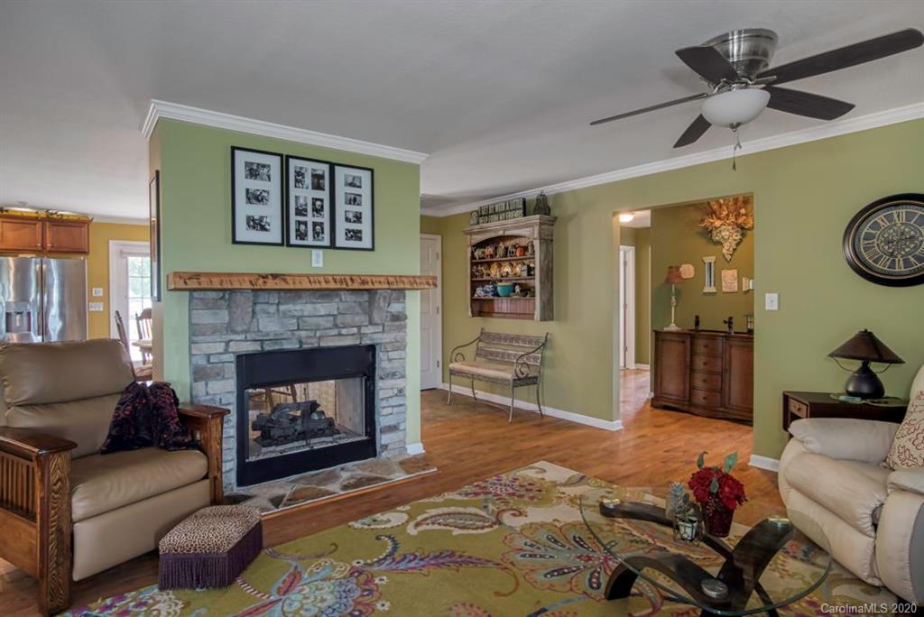 126 Barkers Grove Road Union Grove, NC 28689 - Photo 5 of 48 a living room with furniture and a fireplace