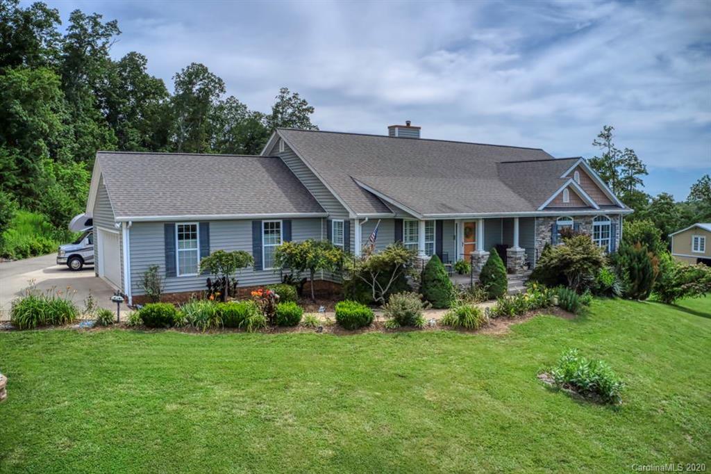 126 Barkers Grove Road Union Grove, NC 28689 - Photo 43 of 48 a view of a house with garden and yard