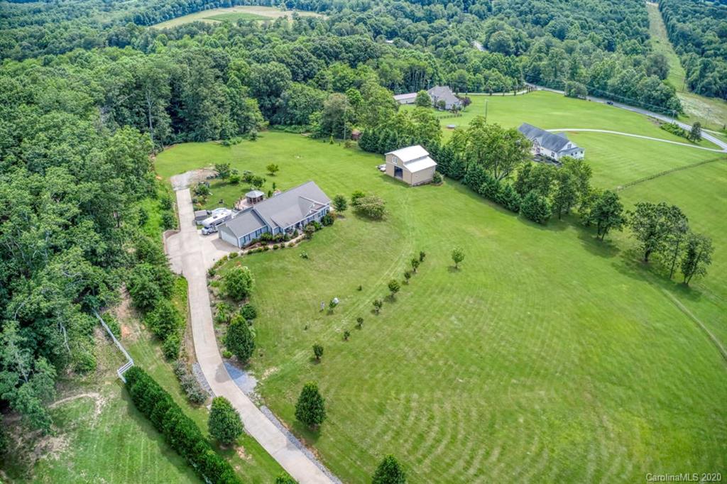 126 Barkers Grove Road Union Grove, NC 28689 - Photo 47 of 48 a view of a golf course with a lake