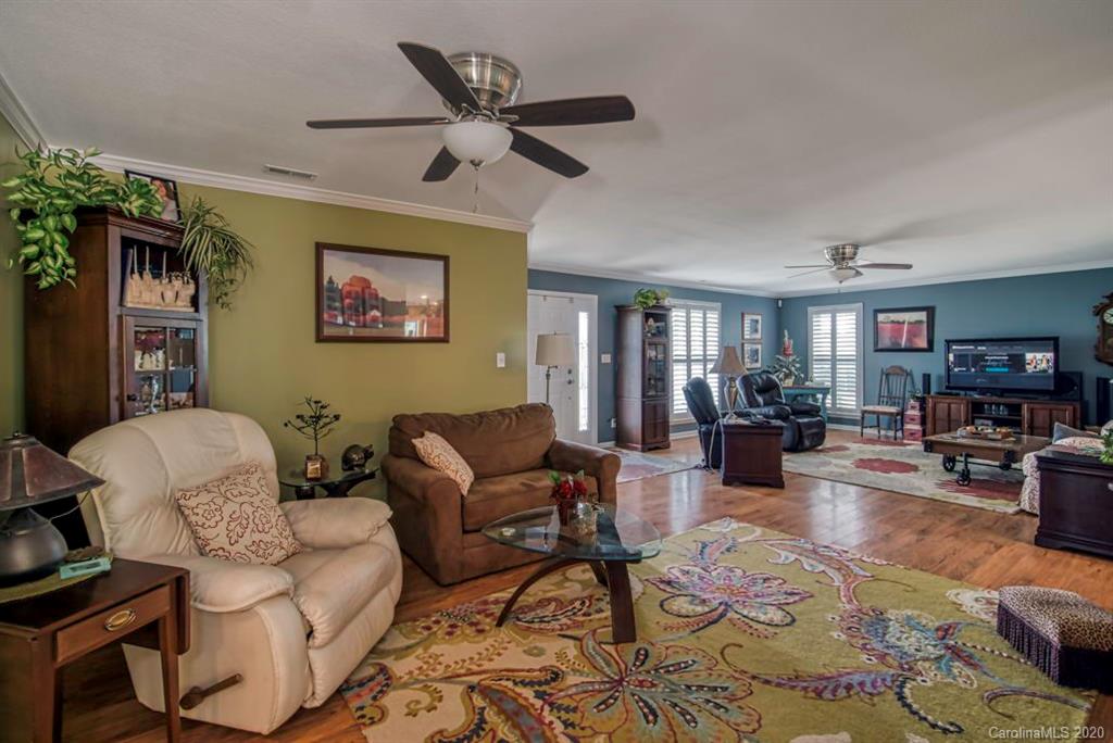 126 Barkers Grove Road Union Grove, NC 28689 - Photo 6 of 48 a living room with furniture kitchen view and a window