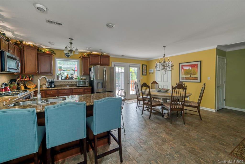 126 Barkers Grove Road Union Grove, NC 28689 - Photo 8 of 48 a view of a dining room with furniture