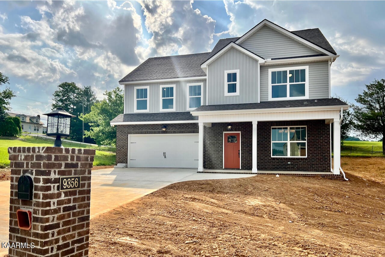 9356 Gabrielle Road Strawberry Plains, TN 37871 - Photo 1 of 39 a front view of a house with a yard