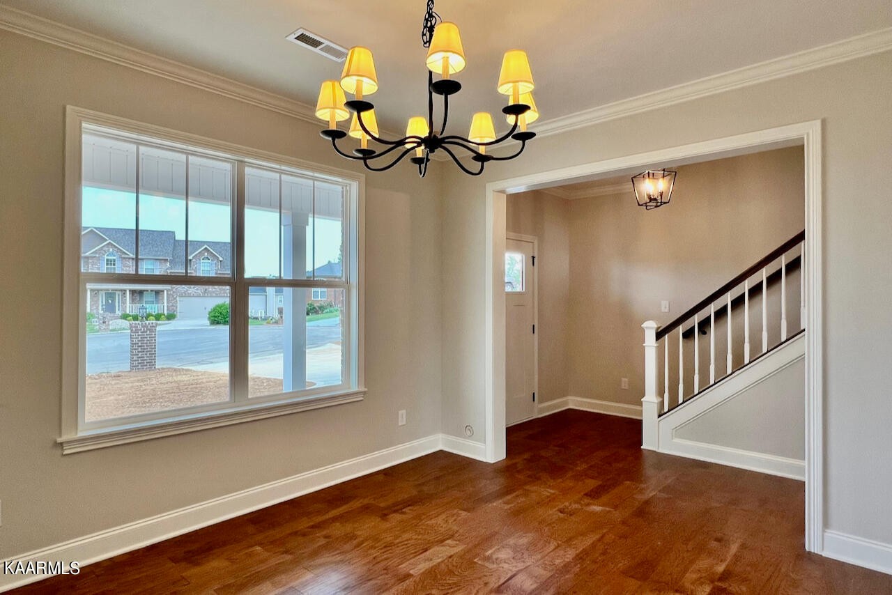 9356 Gabrielle Road Strawberry Plains, TN 37871 - Photo 4 of 39 a view of an entryway with wooden floor