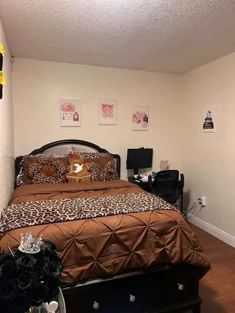 a room with furniture and a mirror