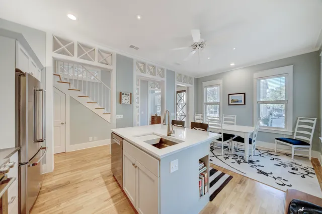 a bedroom with a large bed and a large window