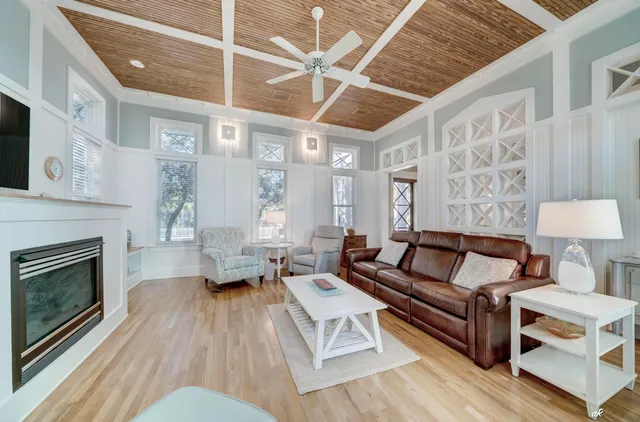 a view of a house with backyard porch and sitting area