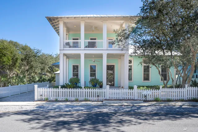 a view of a livingroom with furniture and wooden floor