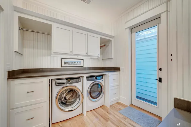 an aerial view of a house with yard and mountain view in back