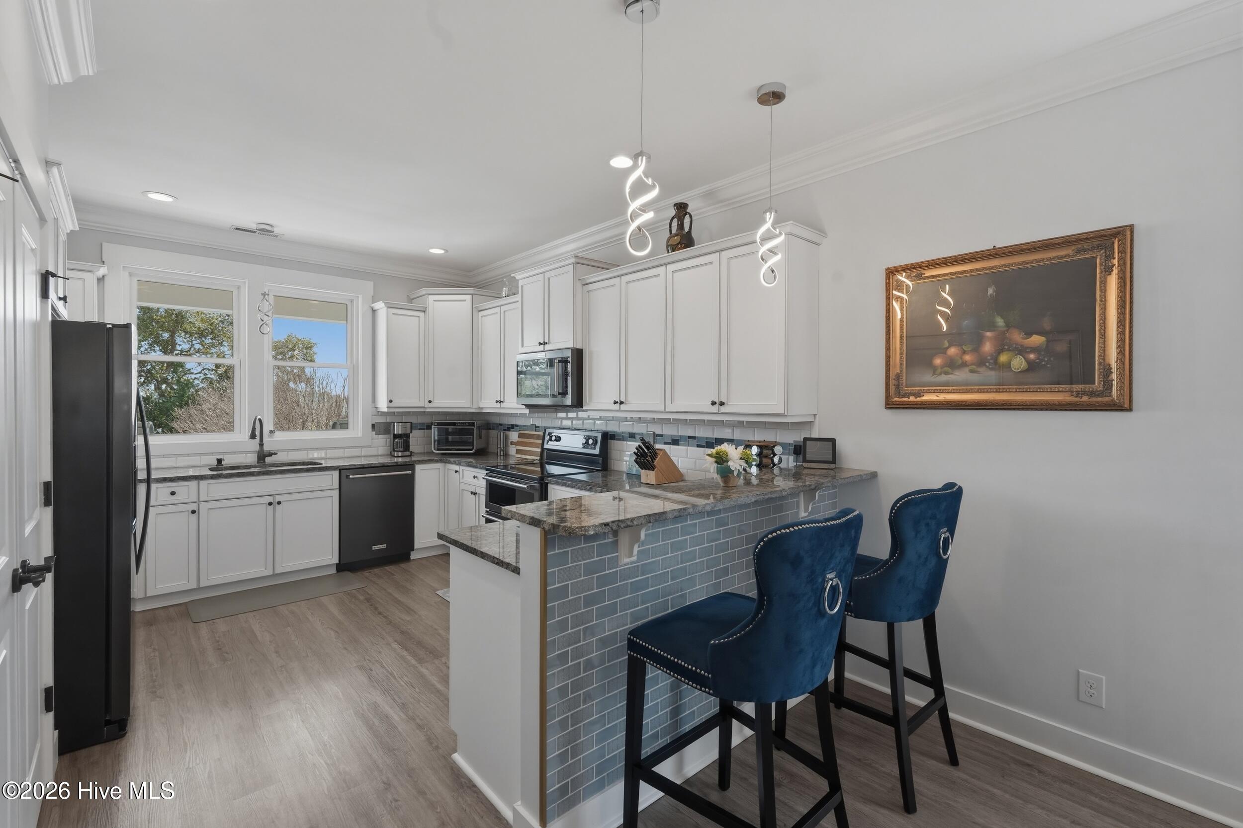 131 Everett Park Trail Holly Ridge, NC 28445 - Photo 25 of 120 Kitchen from Dining Room