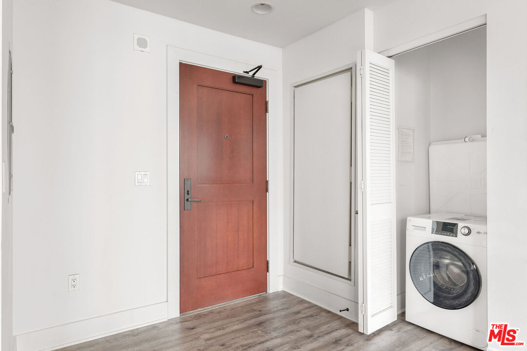 460 South Spring Street, Unit 507 Los Angeles, CA 90013 - Photo 14 of 25 a view of a storage & utility room with washer and dryer