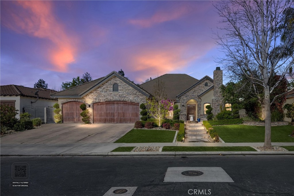 2103 Redmire Street Bakersfield, CA 93311 - Photo 1 of 53 a front view of a house with a yard
