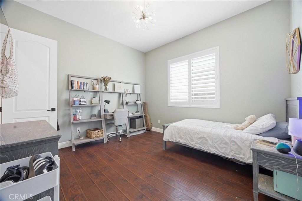2103 Redmire Street Bakersfield, CA 93311 - Photo 34 of 53 a bedroom with a bed and a window