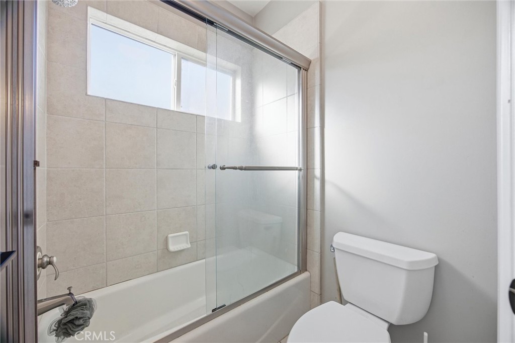 2103 Redmire Street Bakersfield, CA 93311 - Photo 41 of 53 a bathroom with a toilet and a shower