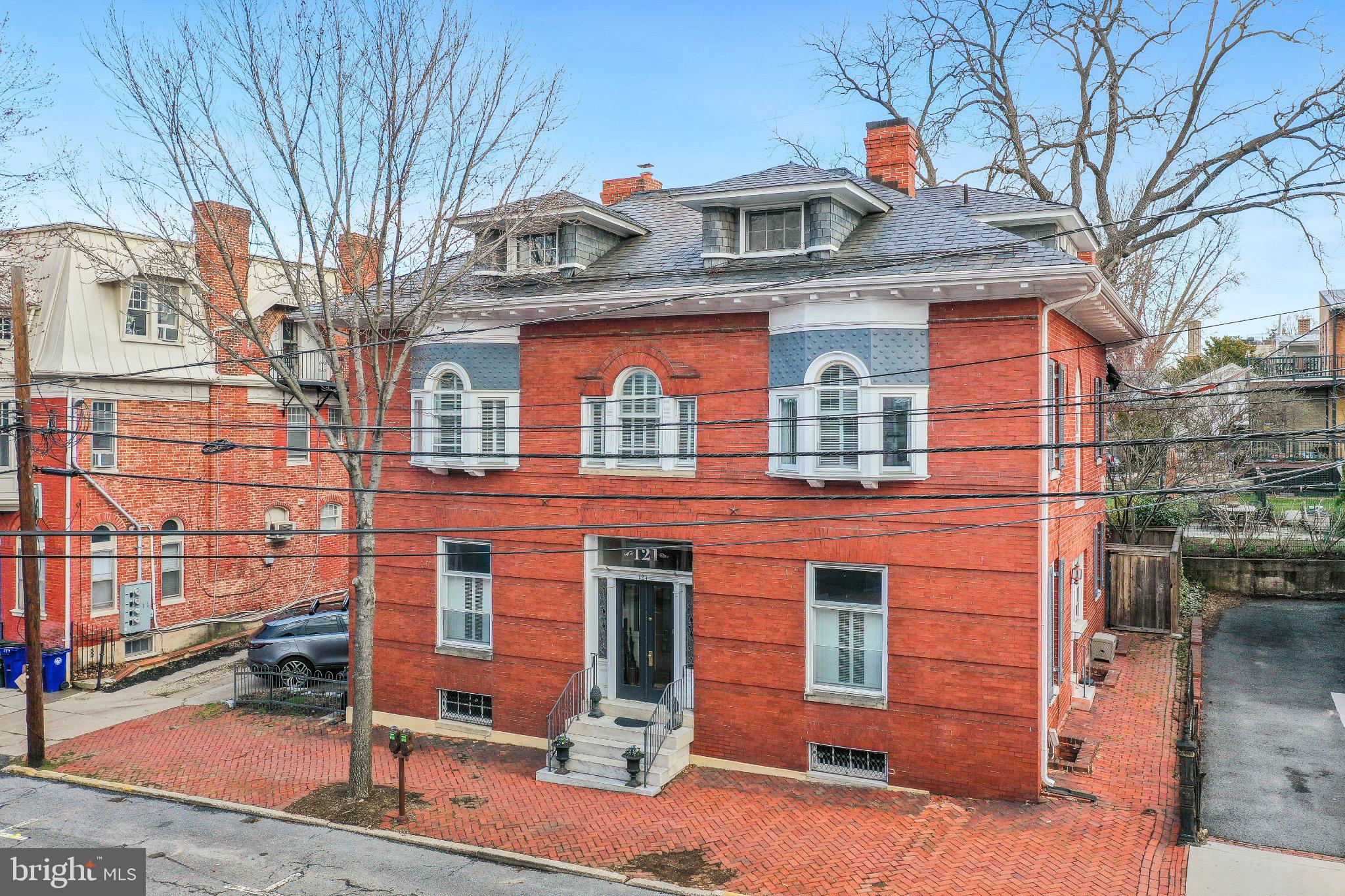 Charming red brick residence awaits!