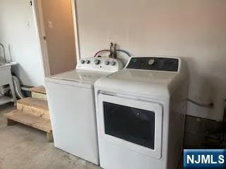 a view of a room with gym equipment and a window