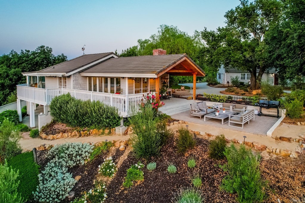 24596 Fuerte Road Temecula, CA 92590 - Photo 2 of 44 a house view with a garden space