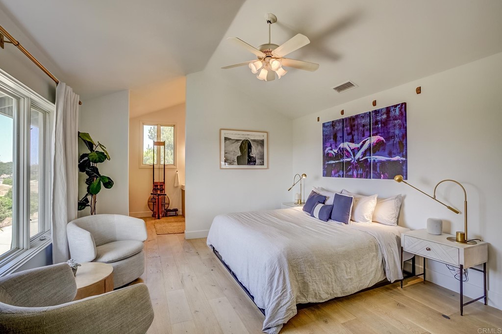 24596 Fuerte Road Temecula, CA 92590 - Photo 13 of 44 a bedroom with a bed and a couch