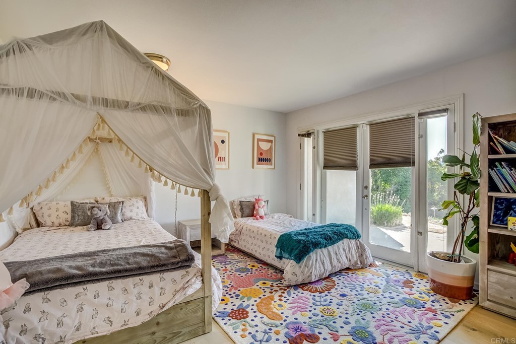 24596 Fuerte Road Temecula, CA 92590 - Photo 21 of 44 a bedroom with furniture and a rug