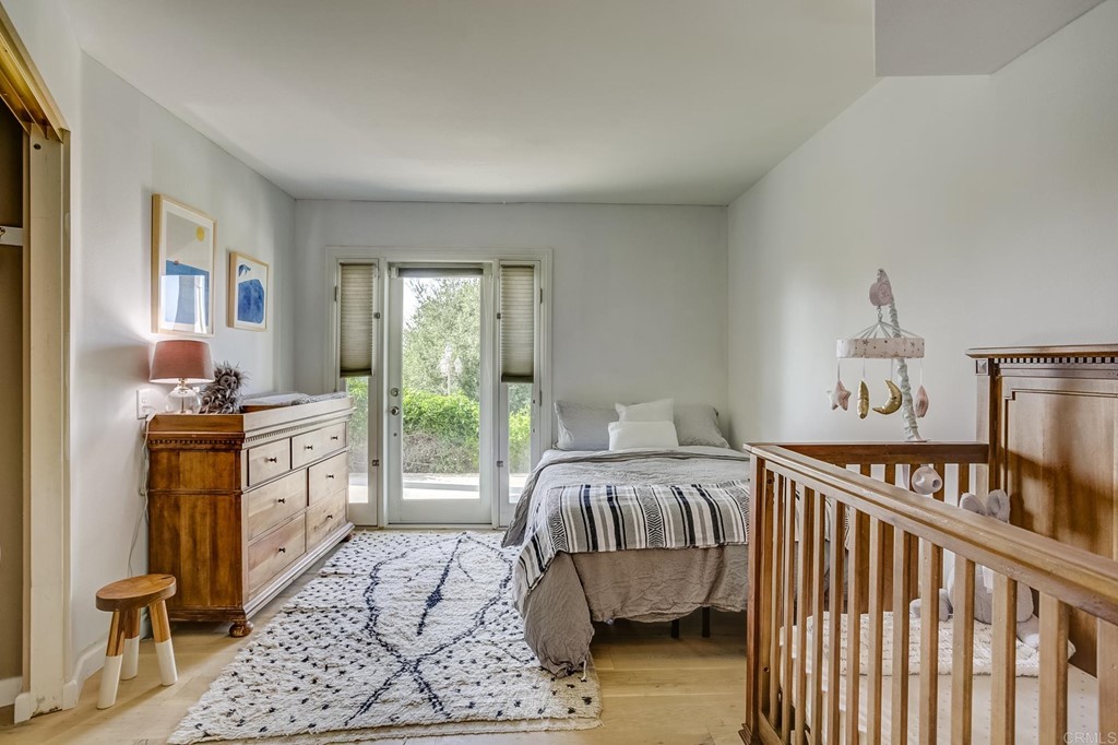 24596 Fuerte Road Temecula, CA 92590 - Photo 22 of 44 a bedroom with furniture and a window