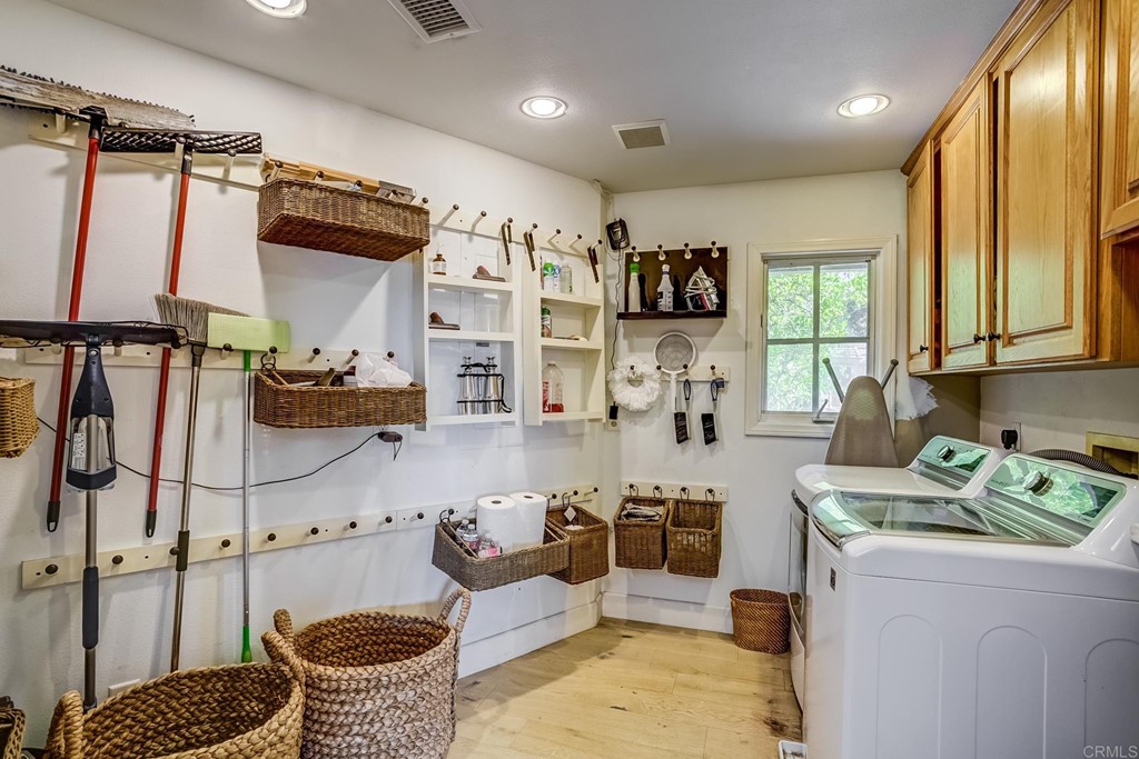 24596 Fuerte Road Temecula, CA 92590 - Photo 25 of 44 a living room with lots of furniture and a window