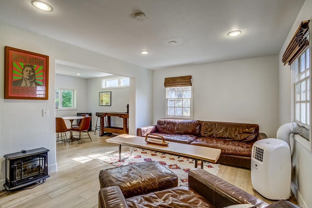 24596 Fuerte Road Temecula, CA 92590 - Photo 27 of 44 a living room with furniture and wooden floor
