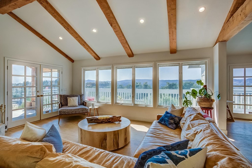 24596 Fuerte Road Temecula, CA 92590 - Photo 8 of 44 a living room with furniture and a large window