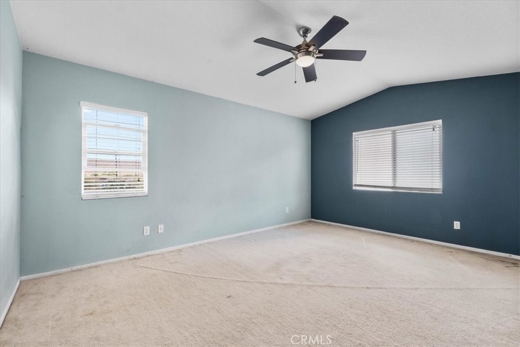 1474 Albillo Loop Perris, CA 92571 - Photo 16 of 35 a view of an empty room with a window