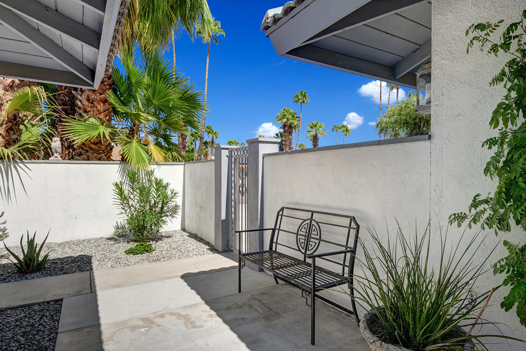 2989 East Sonora Road Palm Springs, CA 92264 - Photo 31 of 33 SIDE PATIO SEATING AND DRIVEWAY GATE MLS